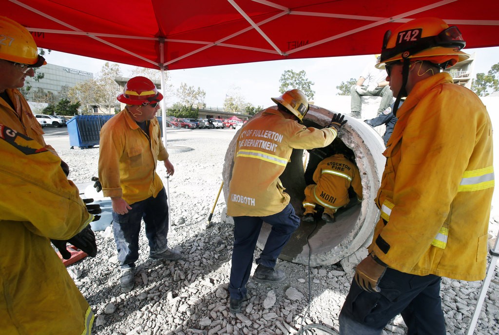 Firefighters participate in an Urban Rescue exercise at Anaheim Fire's North Net Training center. Photo by Christine Cotter