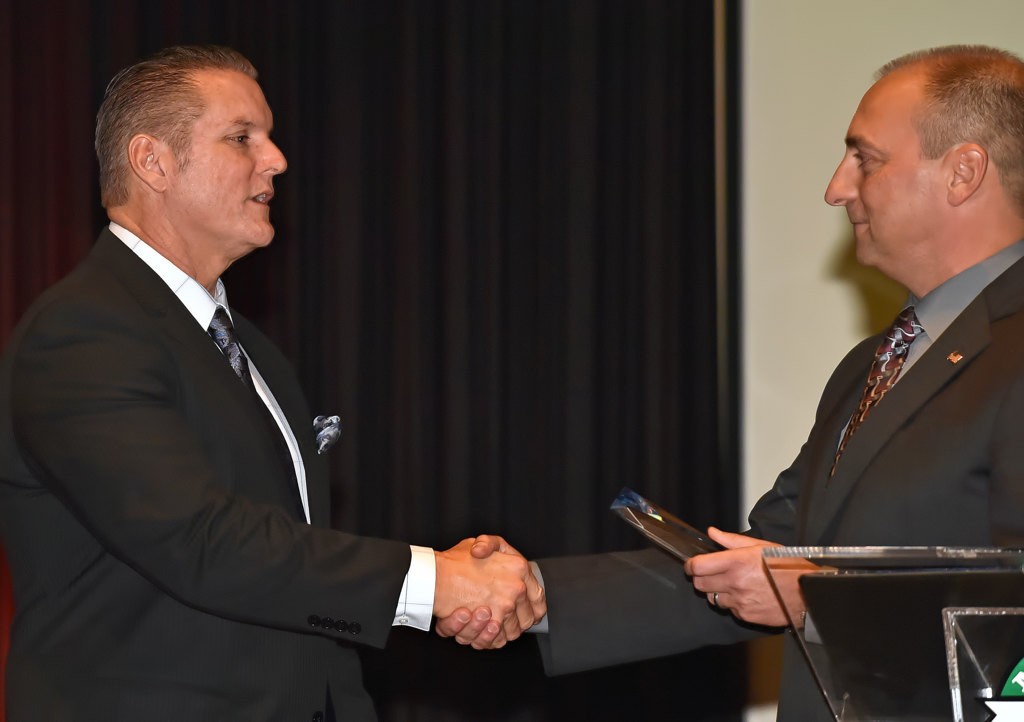 Sgt. Del Pickney receives the TPD Lifetime Achievement Award from Tustin Police Chief Charles Celano during the Tustin PD awards banquet. Later that night he also received the TPOA Supervisor of the Year award. Photo by Steven Georges/Behind the Badge OC