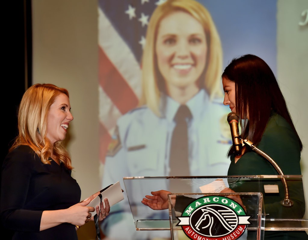 Kristin Fetterling, left, receives the TPSSA Dedication & Professionalism award during the Tustin PD awards banquet. Photo by Steven Georges/Behind the Badge OC