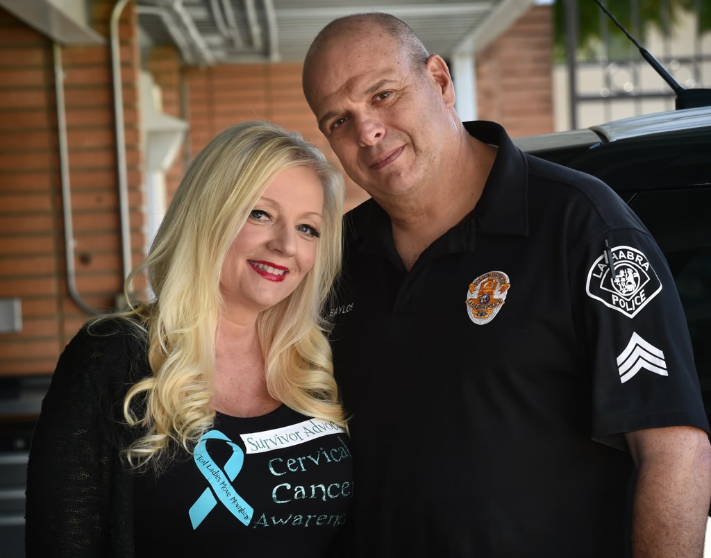 Sgt. Jeffrey Baylos of the La Habra PD with his wife Loretta Baylos, a cervical cancer surviver. The two are active in cervical cancer awareness and support for the victims of cervical cancer. Photo by Steven Georges/Behind the Badge OC