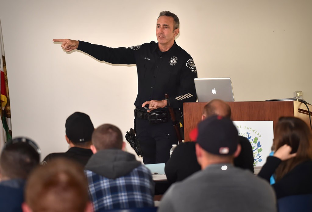 Fullerton PD Officer Eric Franke talks to a crowd of law enforcement officers during an ARIDE (Advanced Roadside Impaired Driving Enforcement) training class at the Fullerton Library. Photo by Steven Georges/Behind the Badge OC