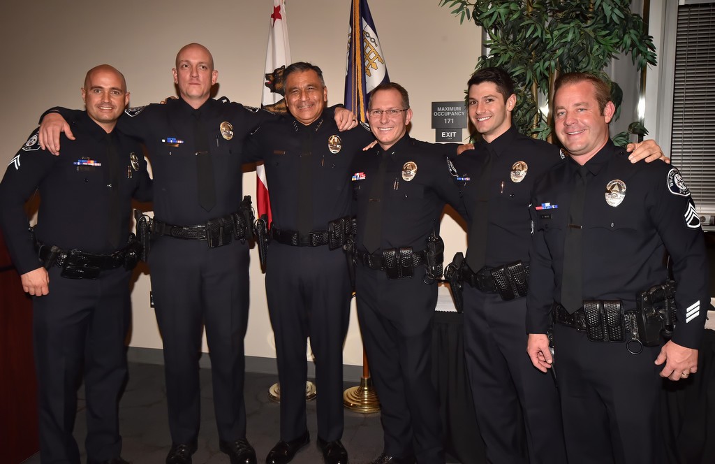 Westminster PD promotion ceremony at the Rose Center. From left, Cpl. Michael Harvey, Cpl. Jeremy Fletcher, Chief Roy Campos, Commander Mark Lauderback, Sgt. Anil Adam and Sgt. Ron Weber. Photo by Steven Georges/Behind the Badge OC