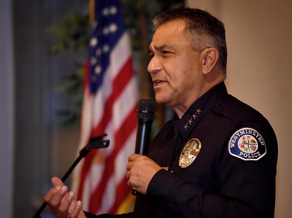 Westminster Police Chief Roy Campos welcomes guest to the Westminster PD promotion ceremony. Photo by Steven Georges/Behind the Badge OC