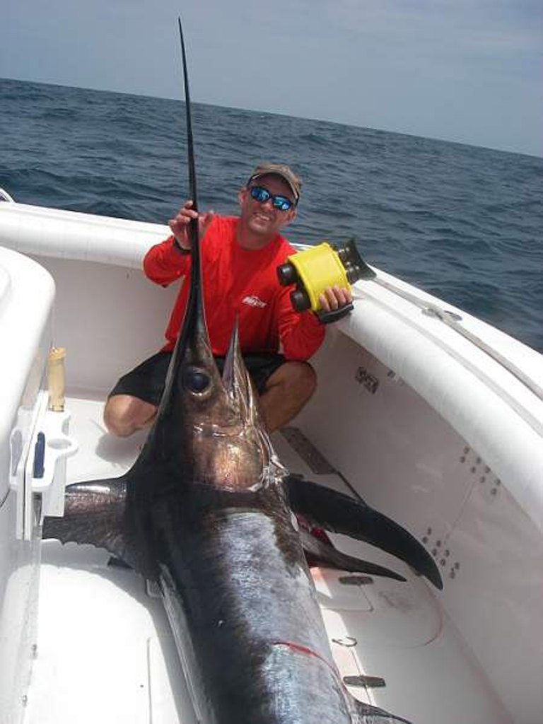 WPD Sgt Jim Kingsmill with a swordfish he caught in 2006 off the coast of southern California.