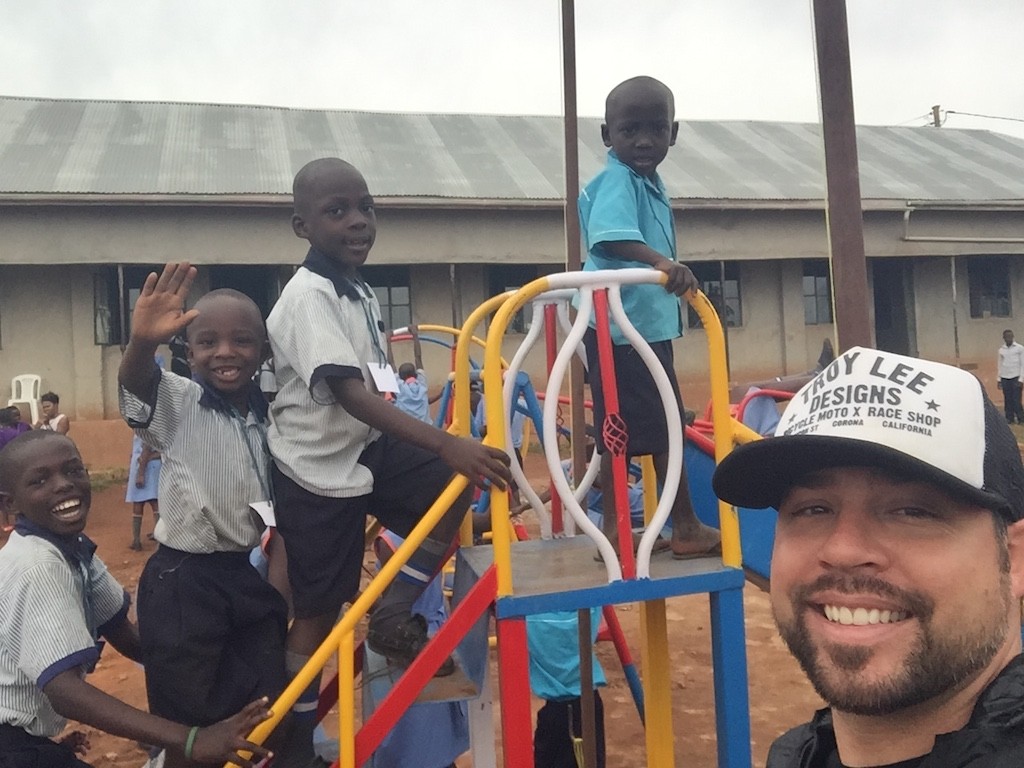 Ryan Obremski with kids after new playground was installed. Photo courtesy of Rudy Valdez