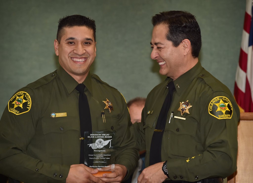 OCSD Deputy Eustacio ÒAnthonyÓ Lopez (Laguna Hills), left, receives the Meritorious Service Award from Lt. Roland Chacon. Photo by Steven Georges/Behind the Badge OC