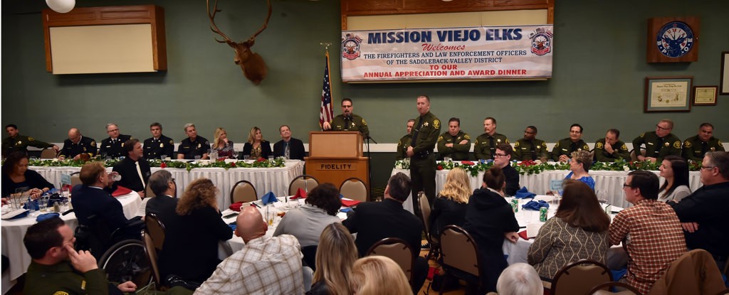 OCSD Lt. Matthew Barr introduces Meritorious Service Award recipient Deputy Bryan Robins during the 2017 Law Enforcement and Firefighters Annual Appreciation Awards Dinner at the MV/SV Elks Lodge. Photo by Steven Georges/Behind the Badge OC