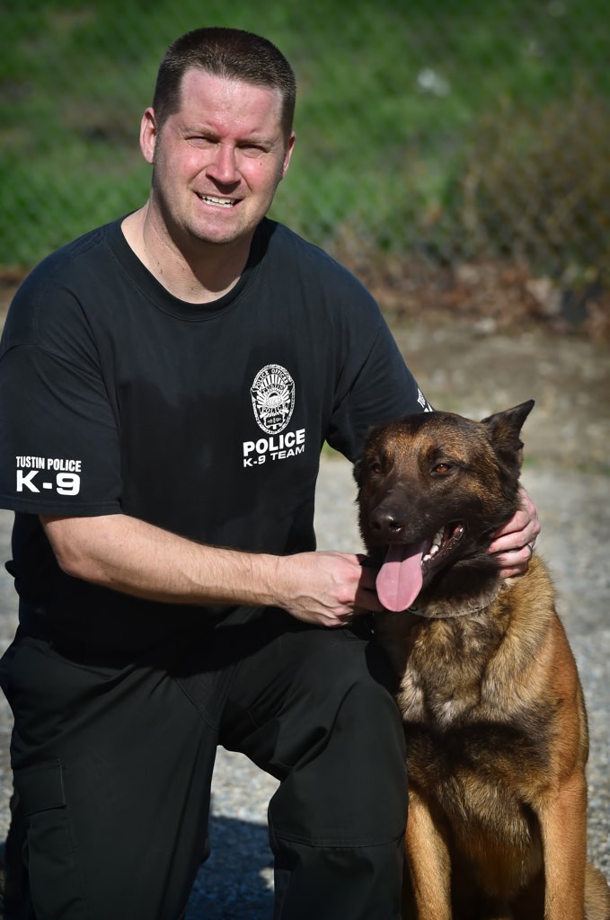 Tustin PD Officer Chuck Mitchell with his new K-9 partner Kingsley, a two and a half year old Belgian Malinois chosen from the Adlerhorst Police K-9 Academy. Photo by Steven Georges/Behind the Badge OC