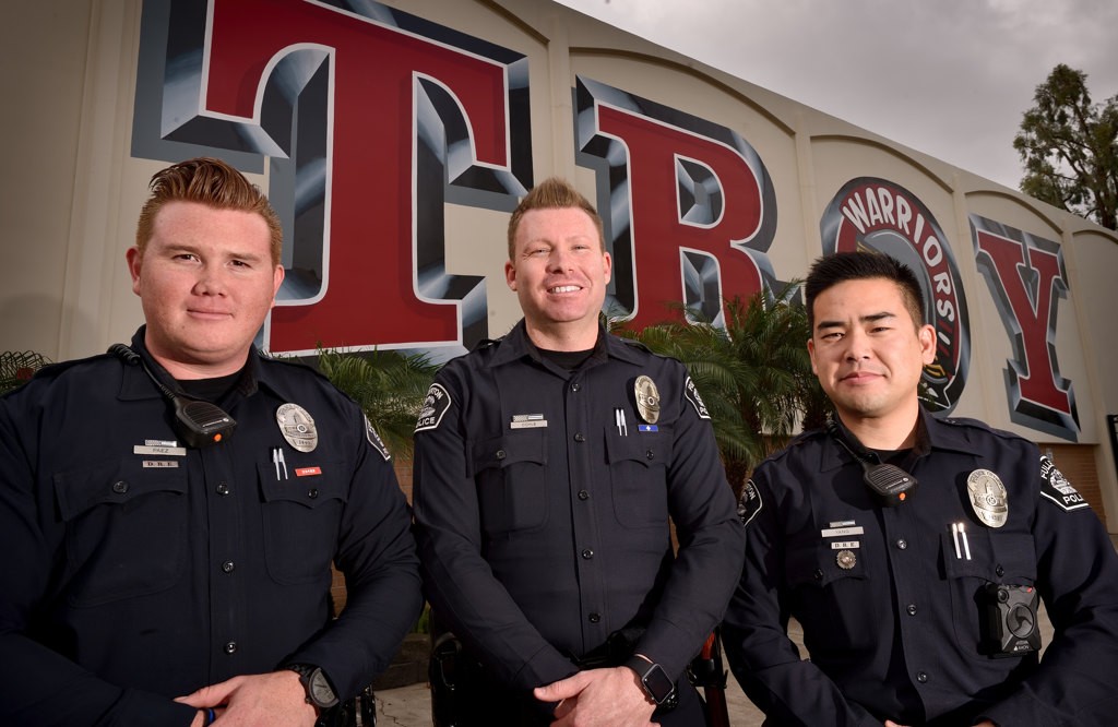Fullerton PD SRO (School Resource Officers) Jose Paez, left, Andrew Coyle and Michael Yang at Troy High School. Photo by Steven Georges/Behind the Badge OC