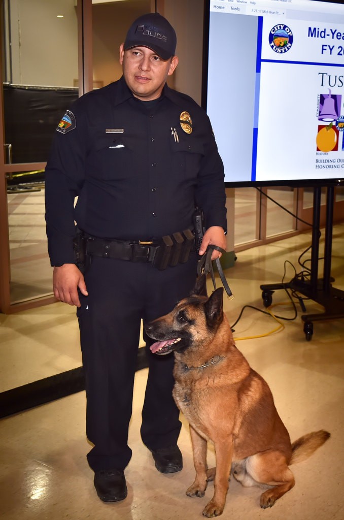 Tustin PD Officer Rene Barraza with his retiring K-9 partner Bravo at Tustin’s city council meeting. Photo by Steven Georges/Behind the Badge OC