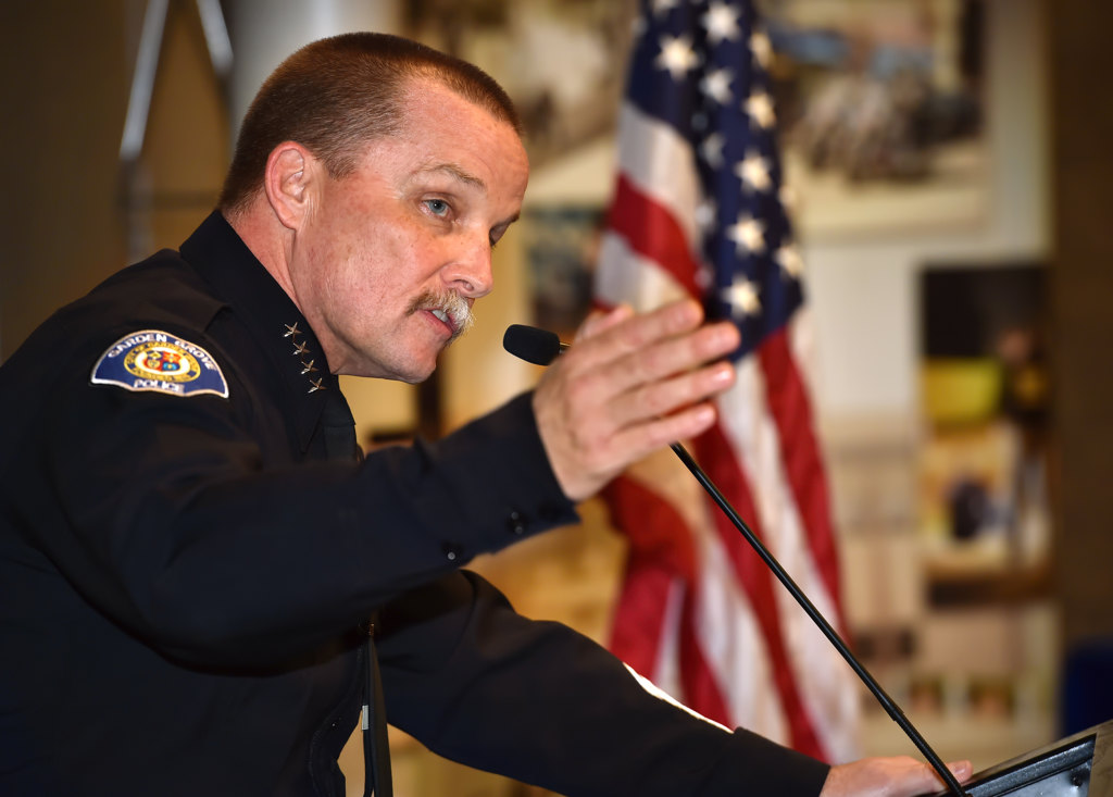 Garden Grove Police Chief Todd Elgin welcomes the families and friends of the two new laterals being sworn in to the GGPD during a ceremony at the Garden Grove Community Meeting Center. Photo by Steven Georges/Behind the Badge OC