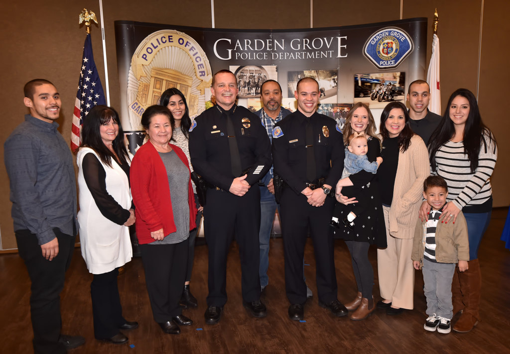 Garden Grove’s new PD Officer Joshua Brannon with his family during his swearing in ceremony. Photo by Steven Georges/Behind the Badge OC