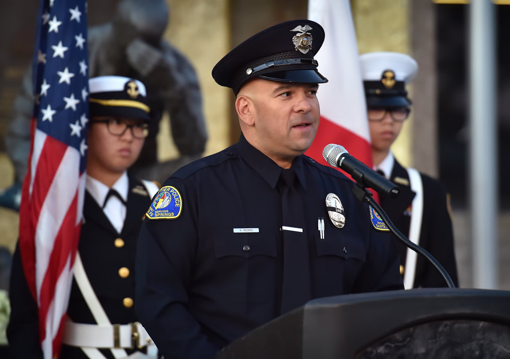 Whittier Police Officer, and President of the Whittier Police Officers’ Association, Mike Rosario talks about his coworker, Officer Keith Boyer, during a prayer vigil at the GGPD Police Officer Memorial. Photo by Steven Georges/Behind the Badge OC