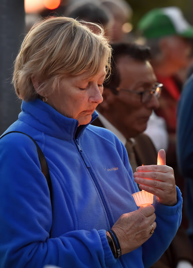 People gather for a candlelight and prayer vigil at the GGPD Police Officer Memorial in honor of Whittier Officer Keith Boyer. Photo by Steven Georges/Behind the Badge OC