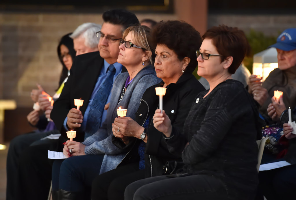 People gather for a candlelight and prayer vigil at the GGPD Police Officer Memorial in honor of Whittier Officer Keith Boyer. Photo by Steven Georges/Behind the Badge OC