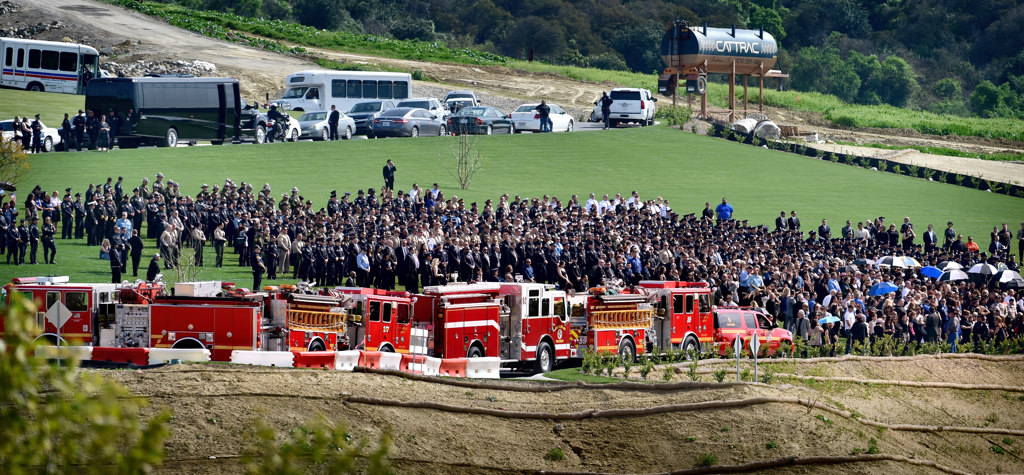 Mourners gather on the lawn at Calvary Chapel Downey for the funeral services of Whittier PD Officer Keith Boyer. Photo by Steven Georges/Behind the Badge OC