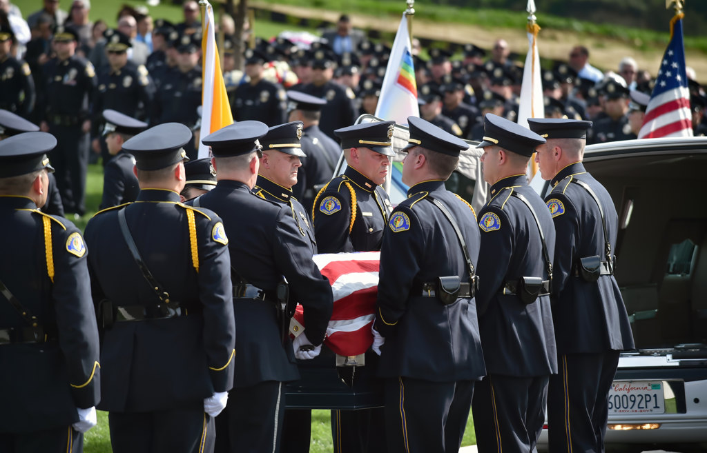 Whittier PD honor guards cary the casket holding Whittier Officer Keith Boyer at Rose Hills Memorial Park. Photo by Steven Georges/Behind the Badge OC