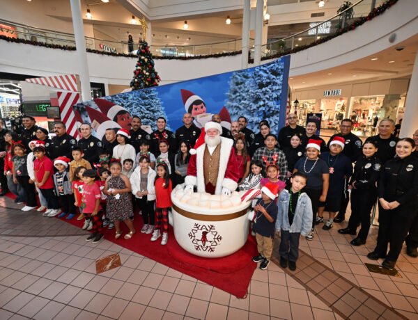 Santa Ana police team up with kids for festive shopping trip